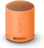 Sony SRS-XB100 Wireless Bluetooth Portable Lightweight Super-Compact Travel Speaker, Extra-Durable IP67 Waterproof & Dustproof, 16 Hour Battery, Versatile Strap, and Hands-Free Calling, Orange New
